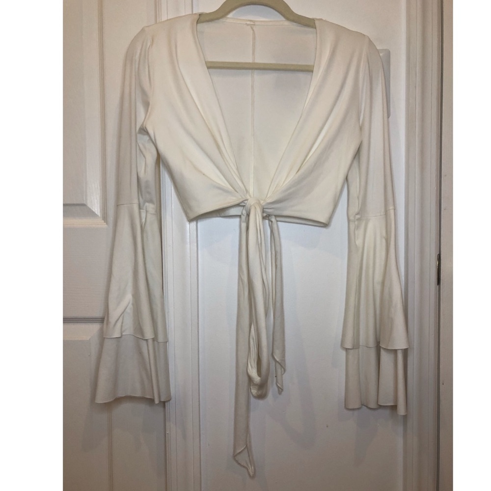 White wrap crop top with long flared bell sleeves